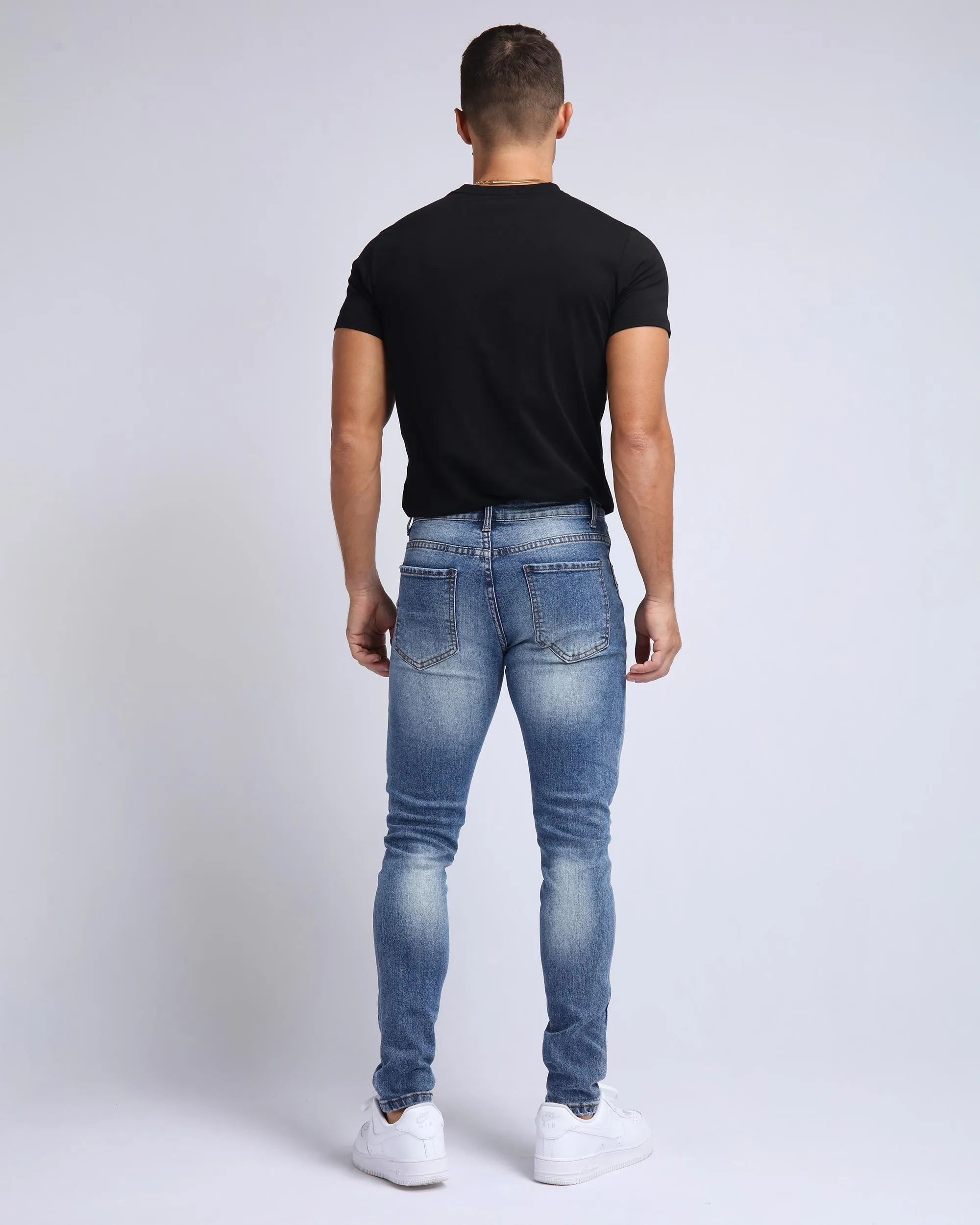 Minimalist Slim Fit Ripped Blue Jeans